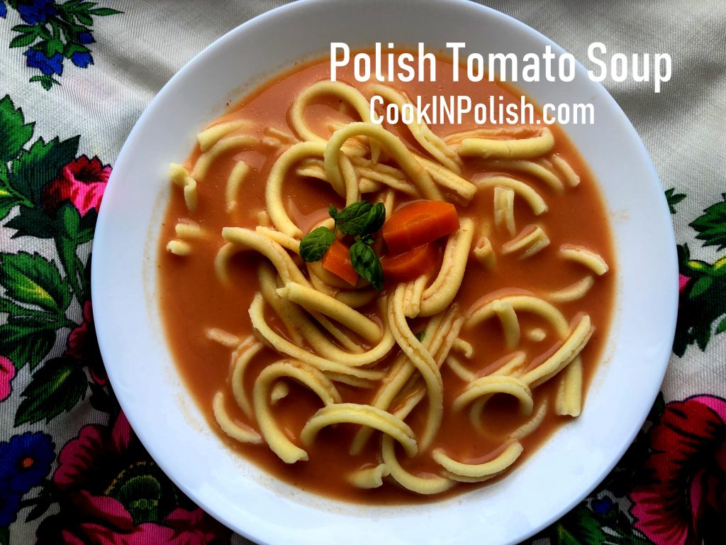 Polish tomato soup served on the plate with pasta