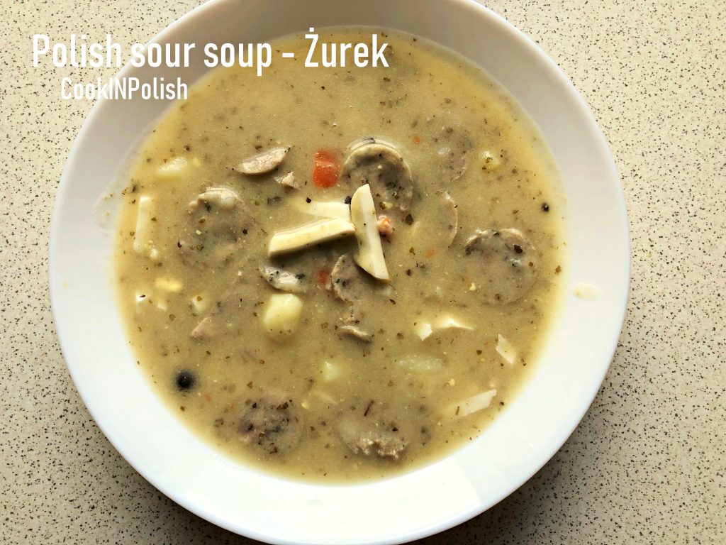 Traditional Polish Soup: Żurek Polish rye soup served on a plate.