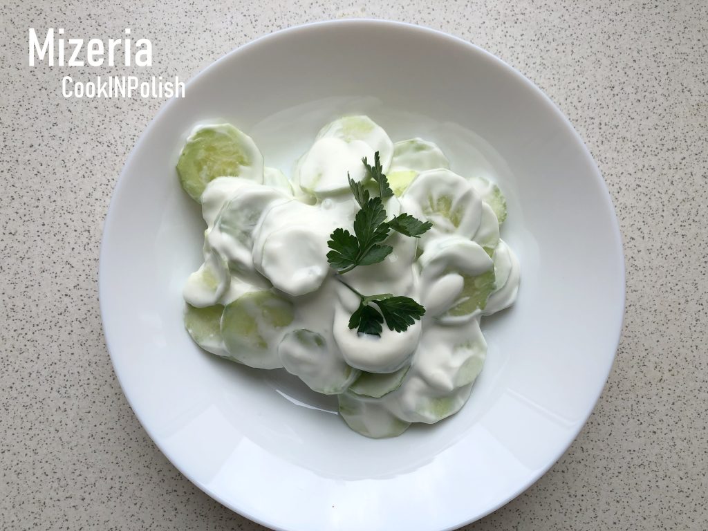 Polish cucumber salad/Mizeria served on a plate