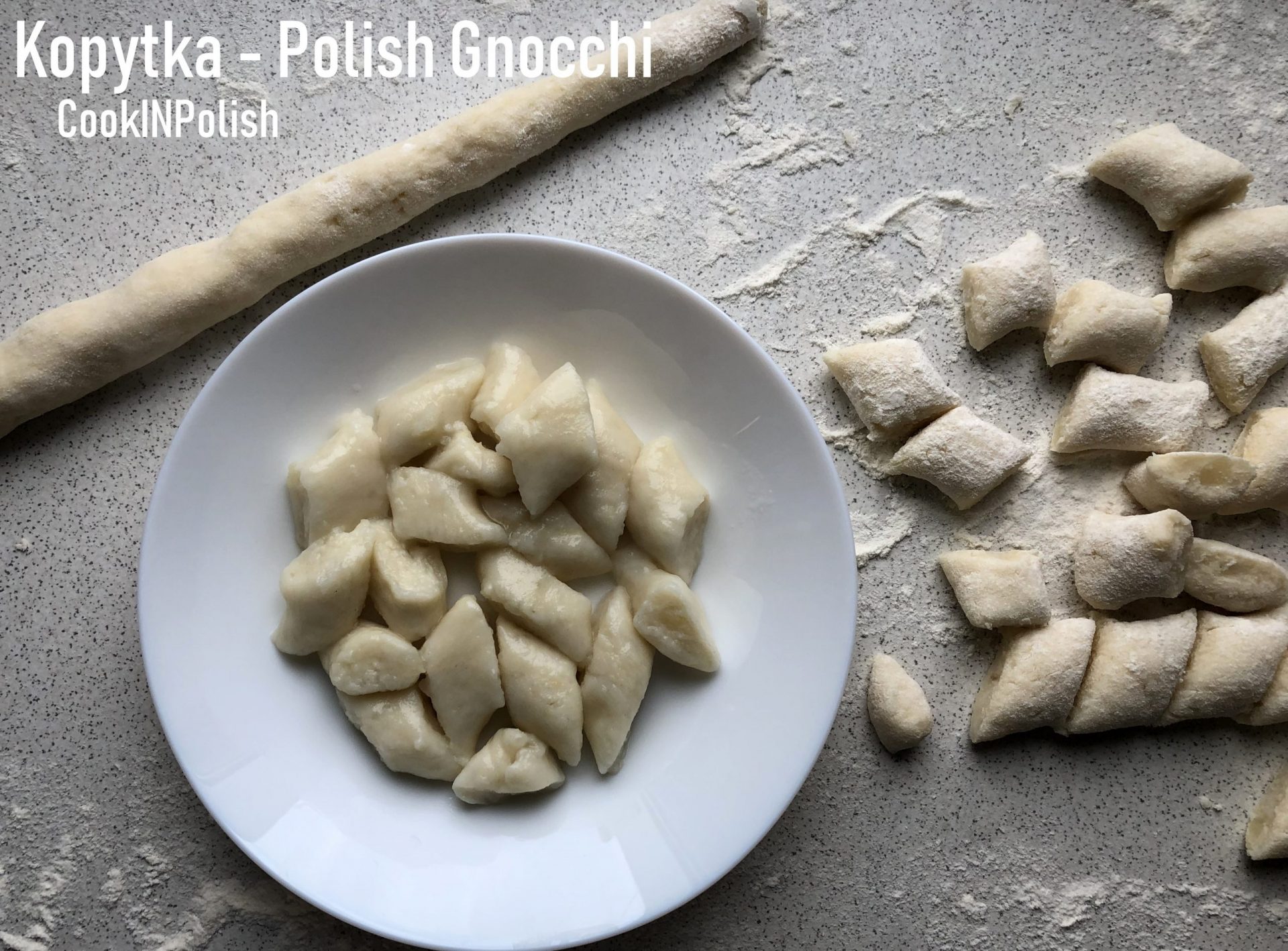 Cooked and uncooked kopytka potato dumplings on the table