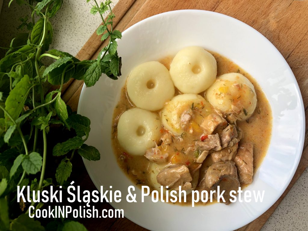 Polish Pork Stew with Silesian Potato Dumplings served on the plate.