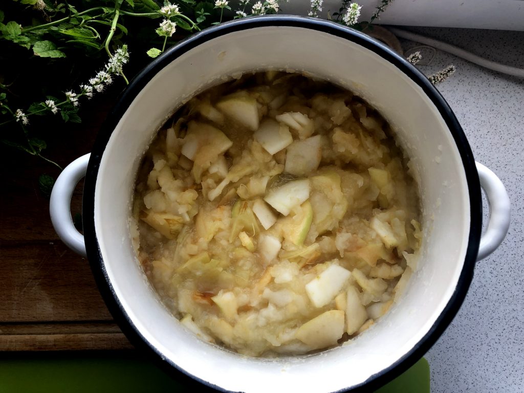 Apples cooked for Polish apple pie with cinnamon.