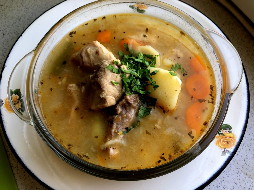 Thick Polish goulash soup served in a bowl.
