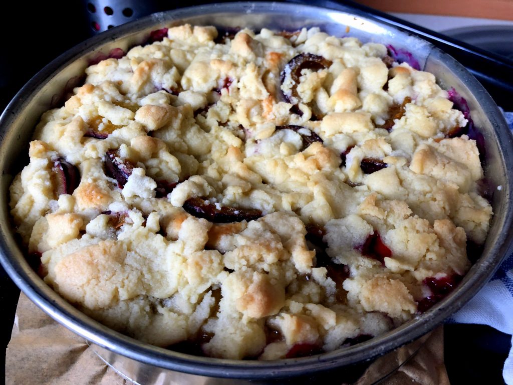 baked yeast cake in a baking dish