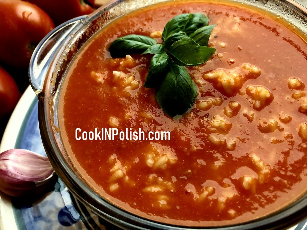Fresh tomato soup served with rice and basil