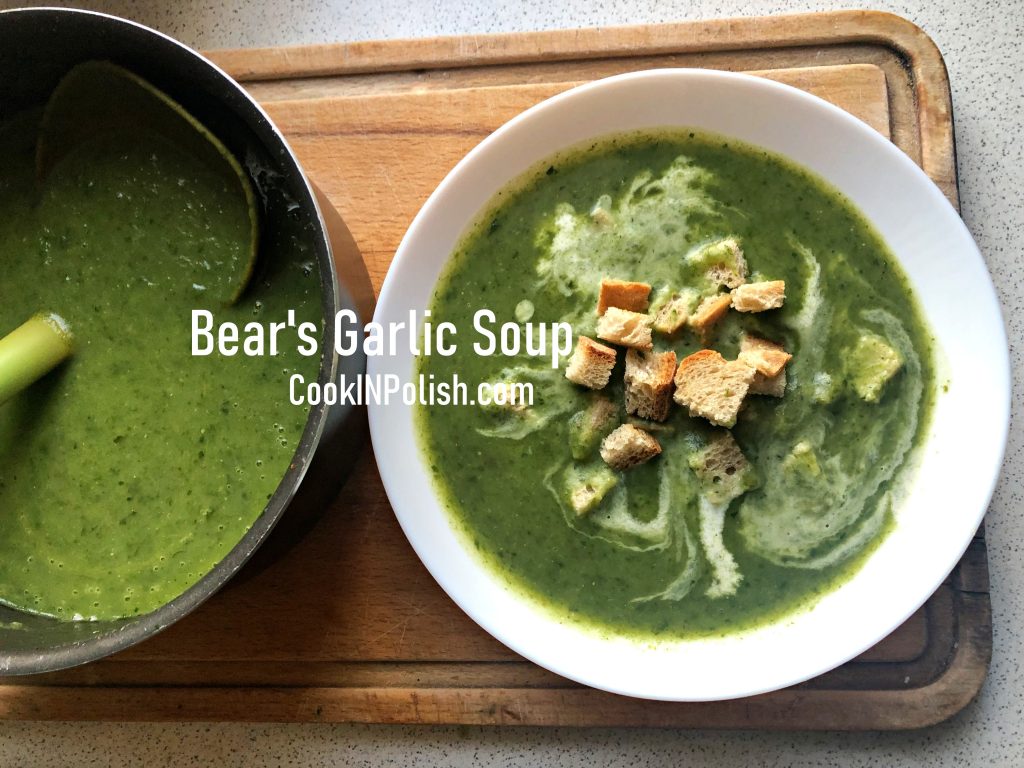 Bear's garlic Creamy Soup served on a plate with toasts and double cream