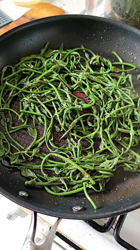 Young Hop shoots sauteed on the pan