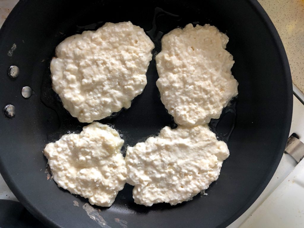 Małdrzyki - White Cheese Pancakes frying on the pan